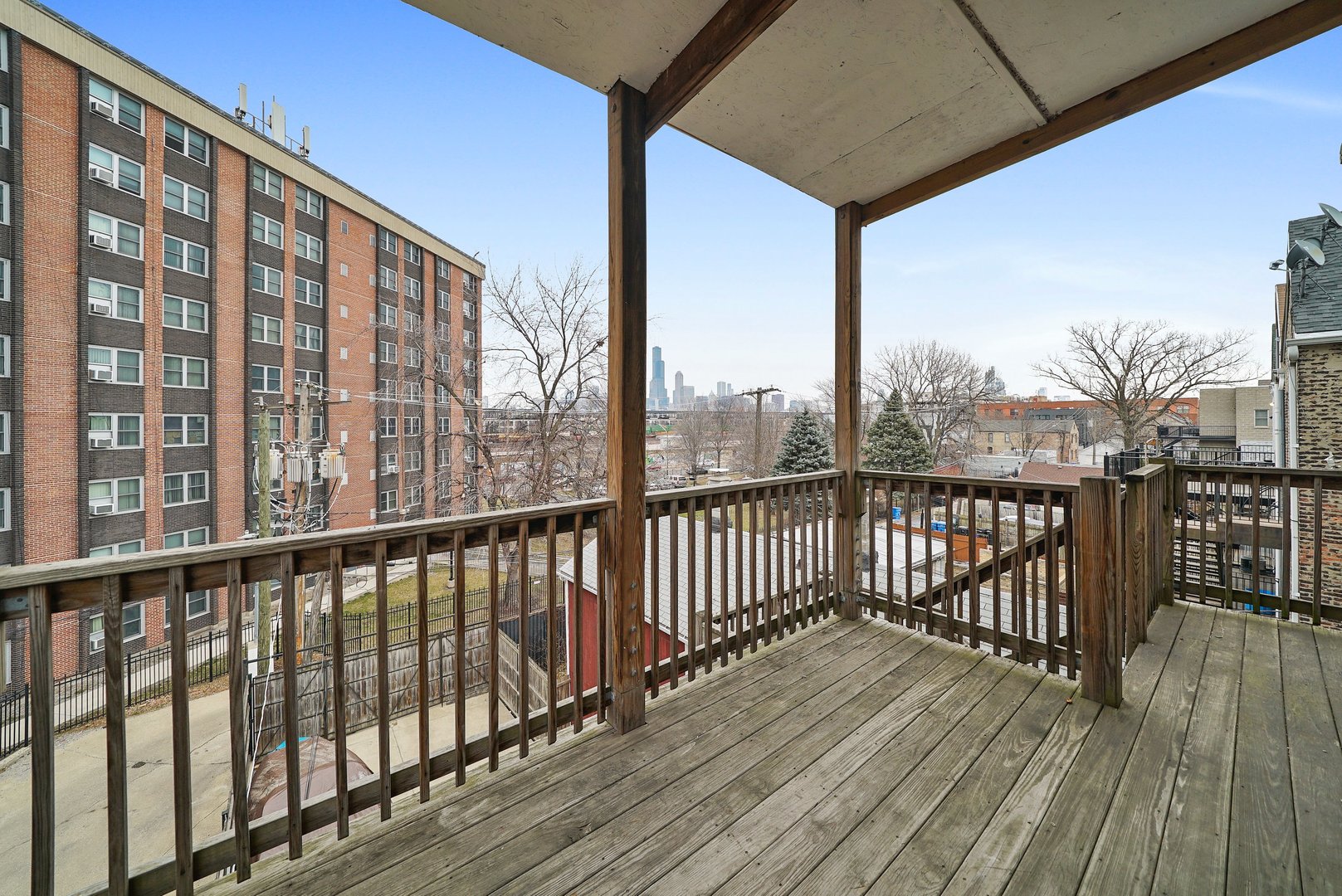 1154 West 17th Street Chicago, IL 60608 - Photo 35 of 35 a view of balcony with wooden floor