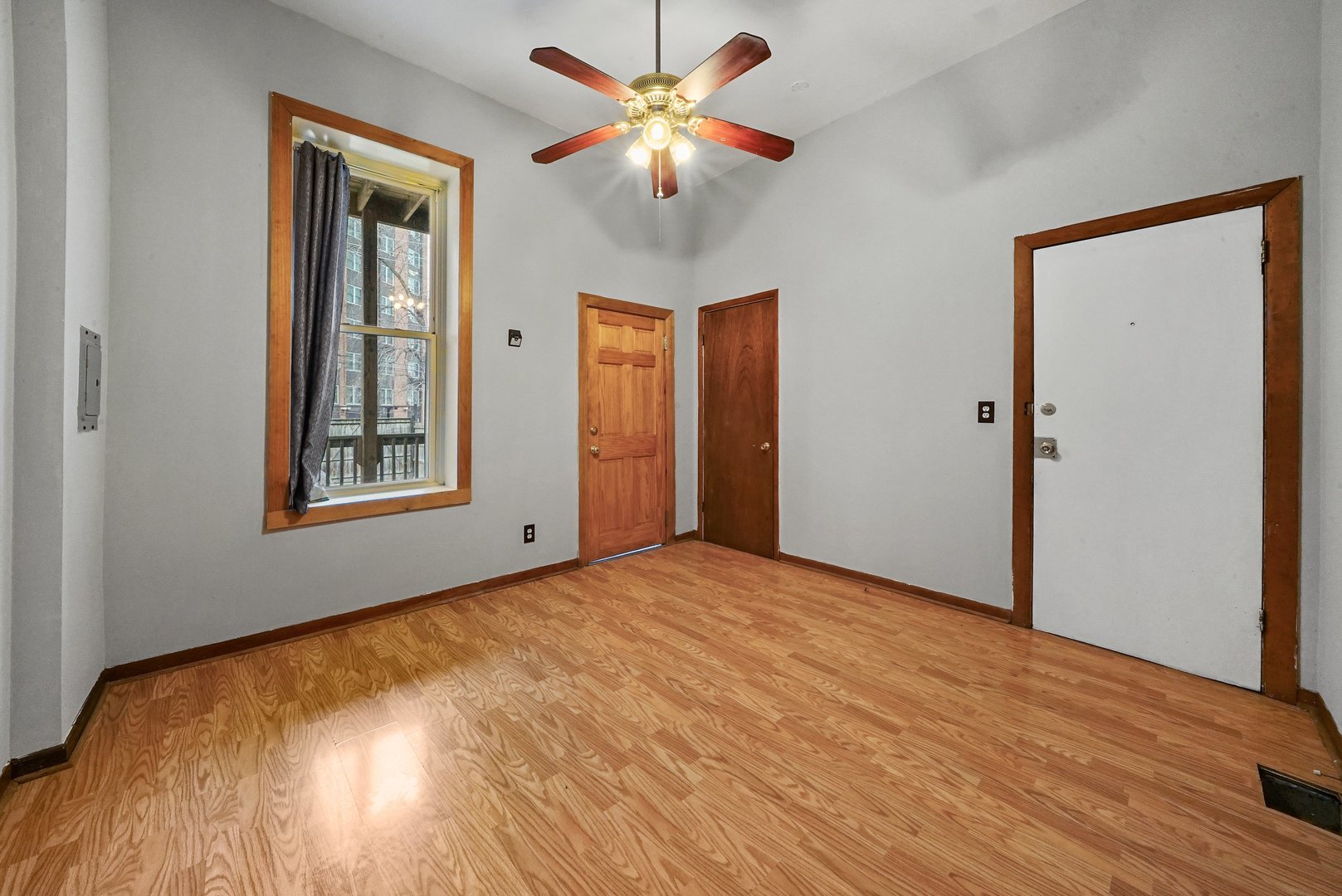 1154 West 17th Street Chicago, IL 60608 - Photo 5 of 35 a view of an empty room with a window