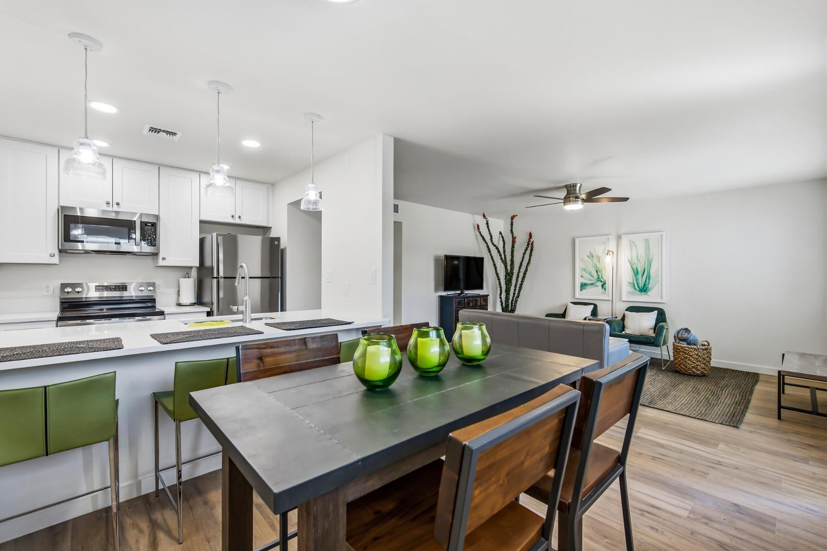 a kitchen with a table and chairs in it