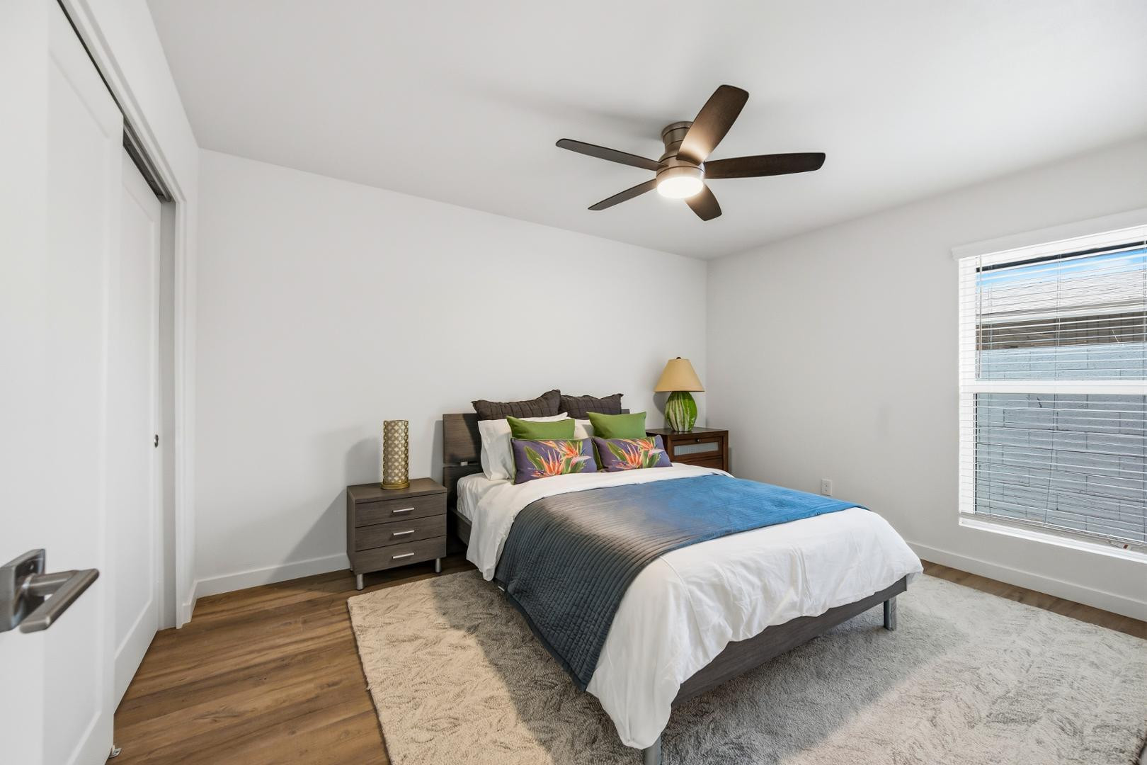 4139 North 27th Street, Unit 2 Phoenix, AZ 85016 - Photo 17 of 31 a bedroom with a bed and a window