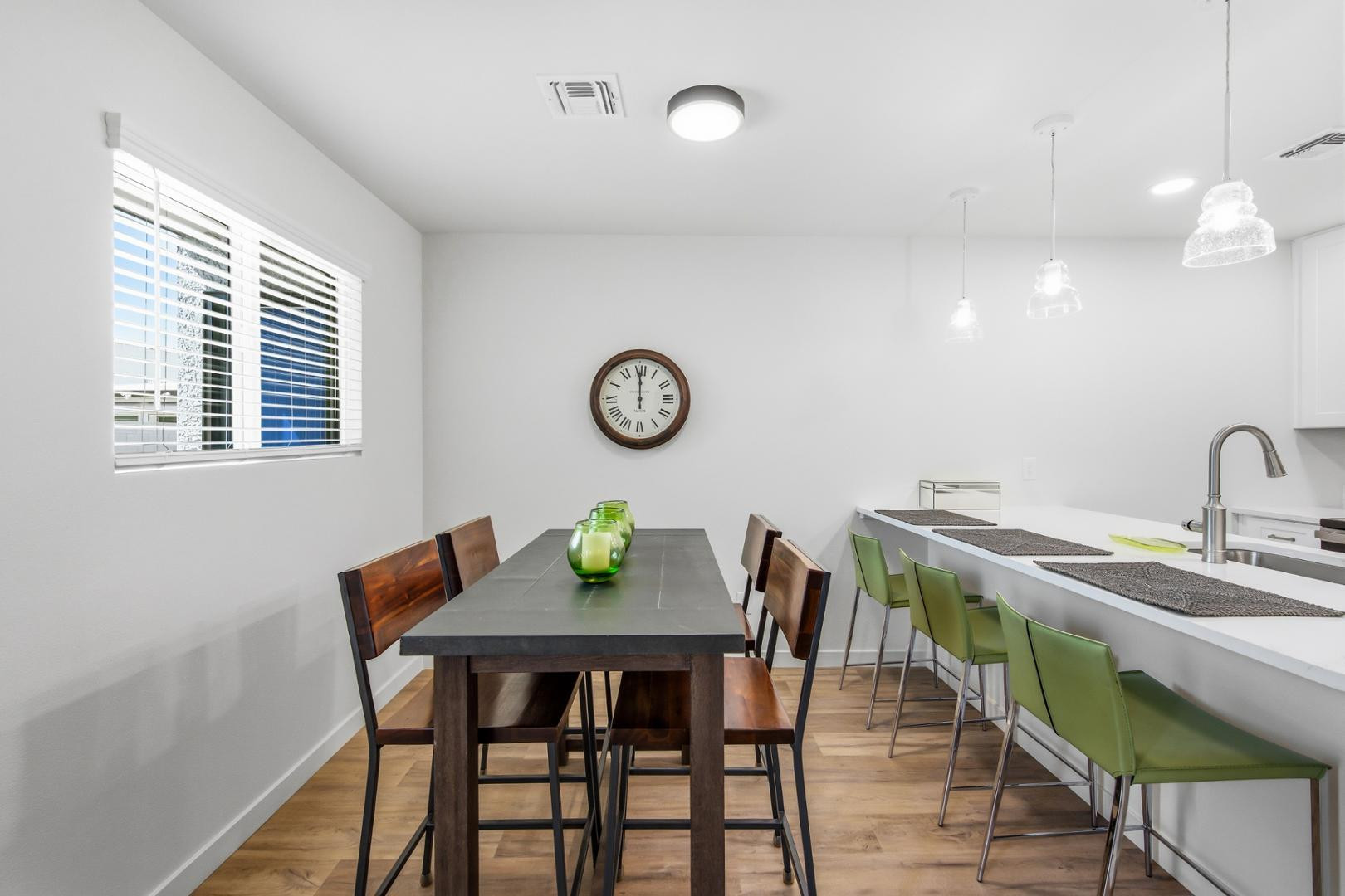 4139 North 27th Street, Unit 2 Phoenix, AZ 85016 - Photo 9 of 31 a view of a dining room with furniture and window