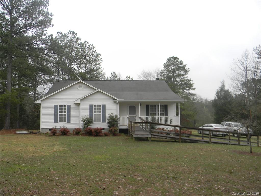 3938 Old Jollystreet Road Prosperity, SC 29127 - Photo 1 of 10 a front view of house with yard and trees around