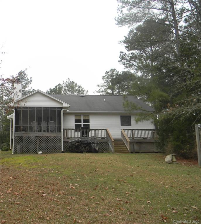 3938 Old Jollystreet Road Prosperity, SC 29127 - Photo 7 of 10 a front view of a house with a yard and garage