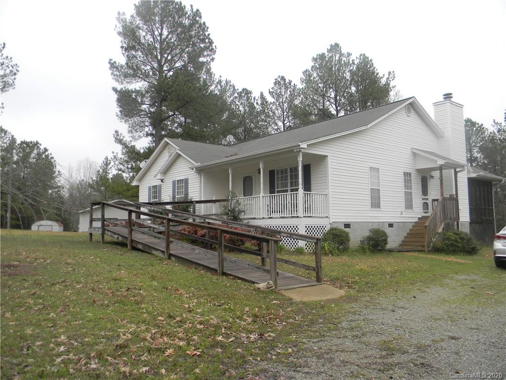 3938 Old Jollystreet Road Prosperity, SC 29127 - Photo 8 of 10 a view of a house with a yard and sitting area