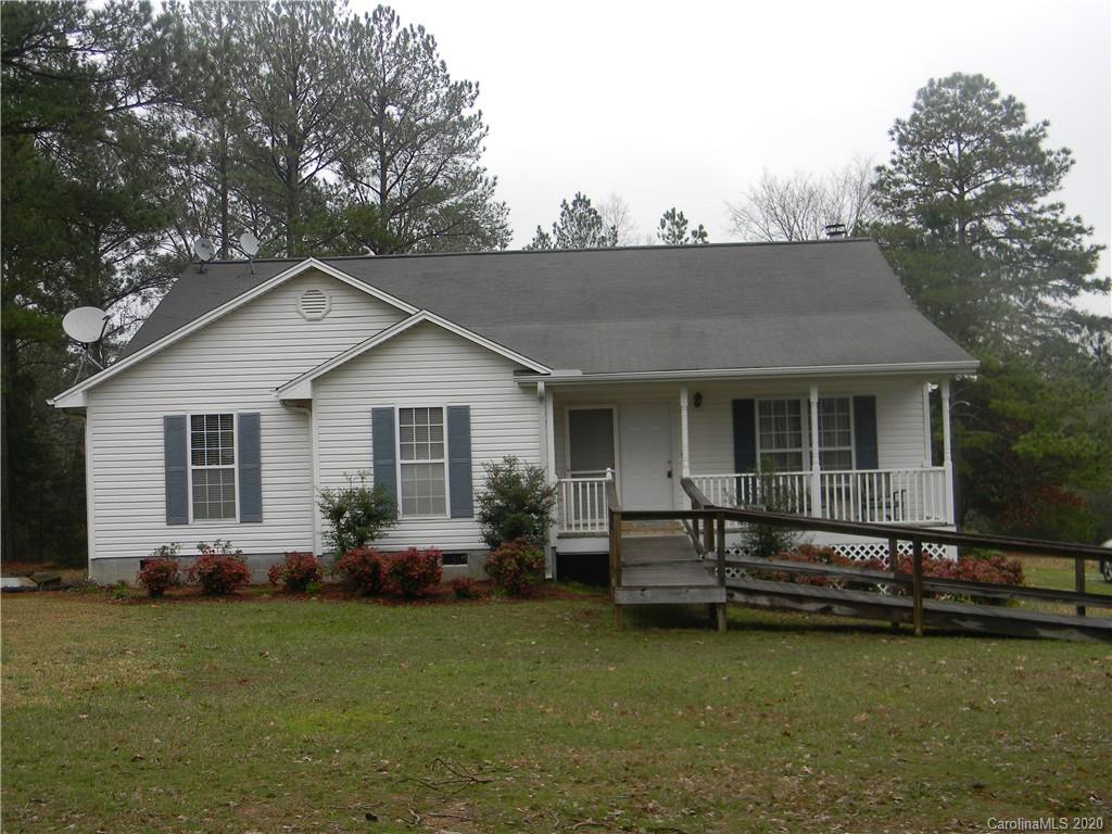 3938 Old Jollystreet Road Prosperity, SC 29127 - Photo 10 of 10 a front view of house with yard and outdoor seating