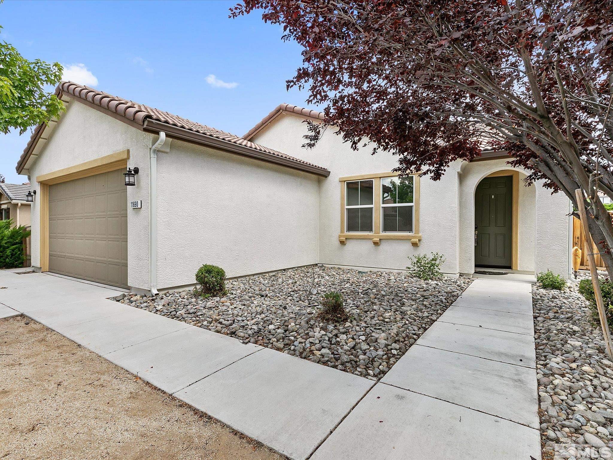 11690 Cervino Drive Reno, NV 89521 - Photo 31 of 31 a front view of a house with trees and plants