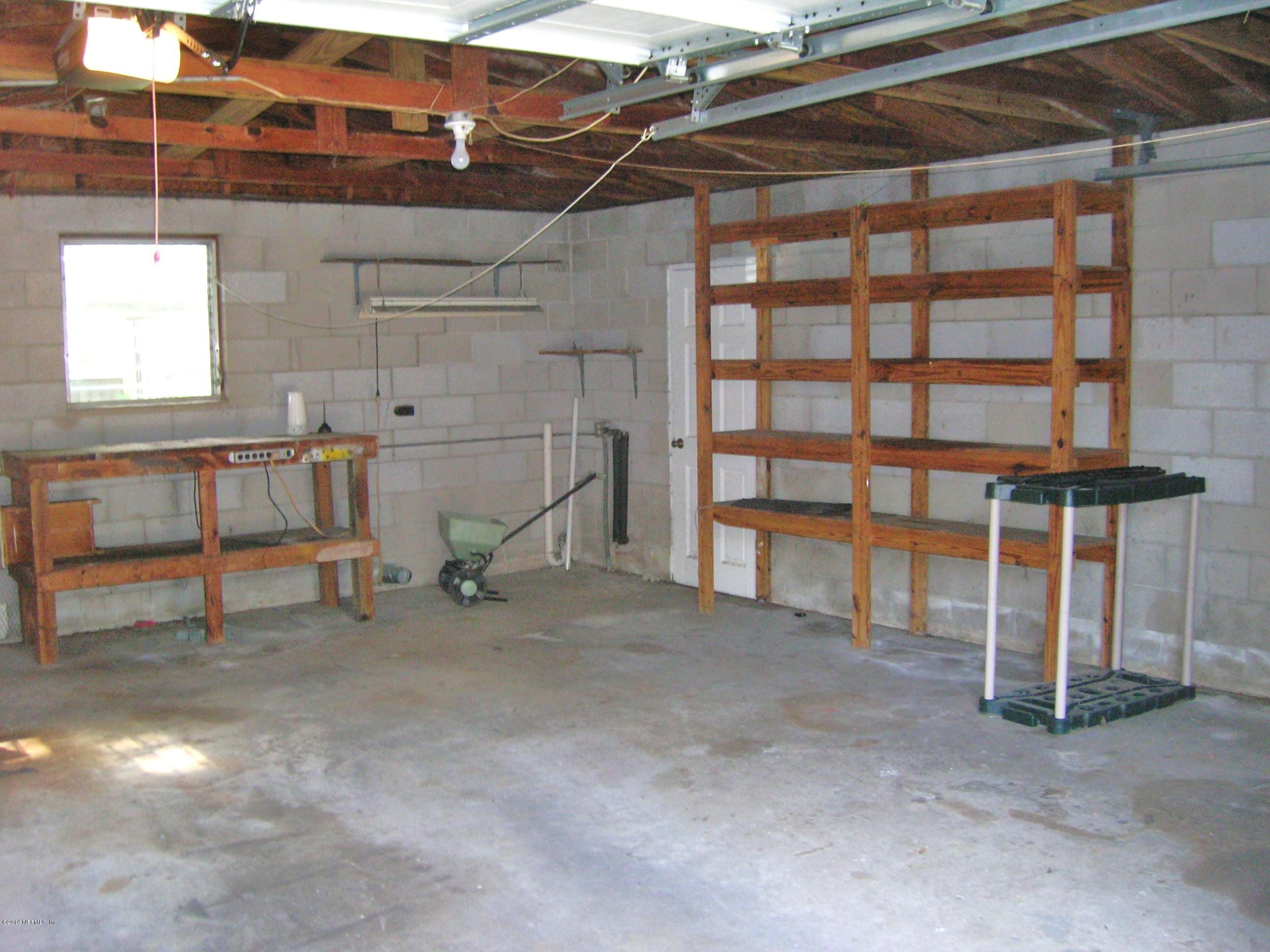 4648 Manchester Road Jacksonville, FL 32210 - Photo 16 of 16 a view of a room with gym equipment