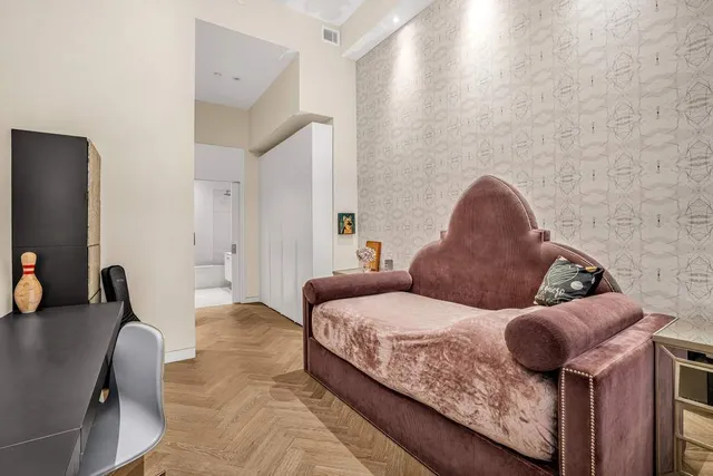 a bathroom with a granite countertop sink mirror and shower
