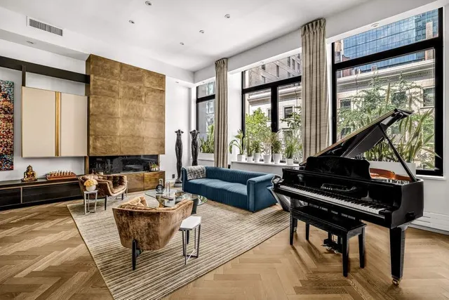 a view of a living room with a large window