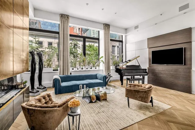 a outdoor living space with furniture and a potted plant