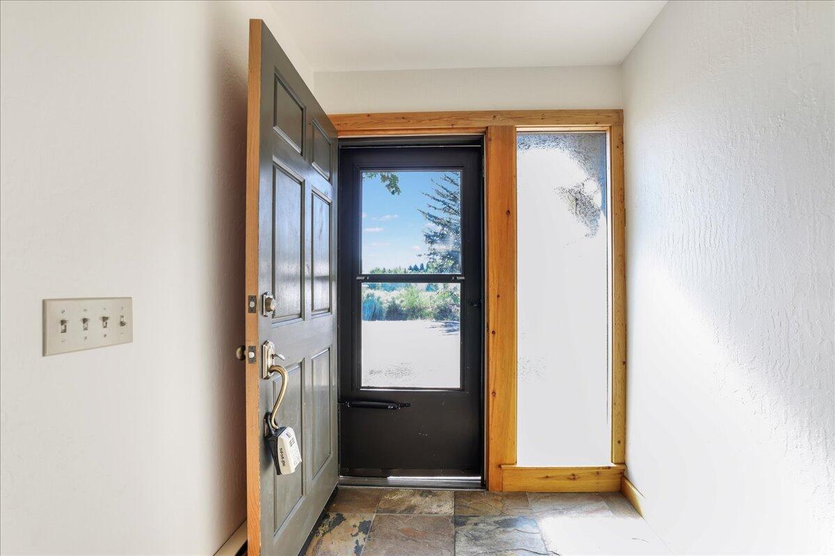 121 4 Seasons Way, Unit 13 Ketchum, ID 83340 - Photo 22 of 51 Slate floor foyer