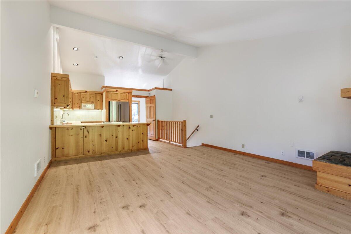 121 4 Seasons Way, Unit 13 Ketchum, ID 83340 - Photo 35 of 51 Living room toward kitchen