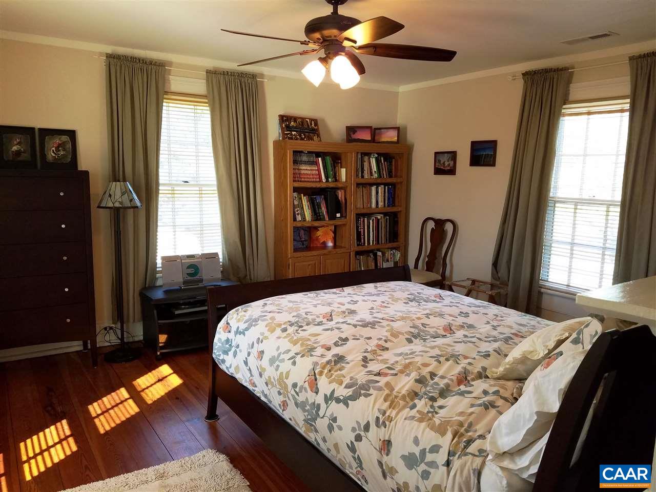 27 Chapel Hollow Road Afton, VA 22920 - Photo 8 of 22 a bedroom with a bed dresser and a window