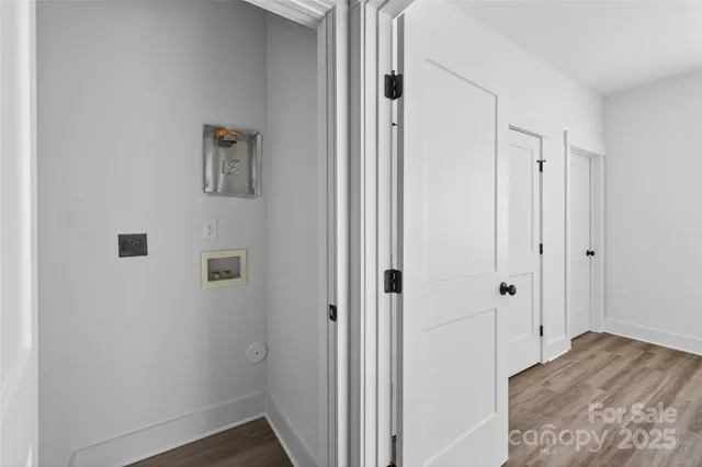 a kitchen with cabinets and stainless steel appliances