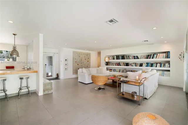 a view of swimming pool with a yard