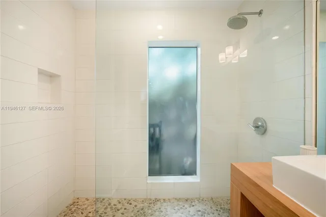 a view of a house with backyard and porch