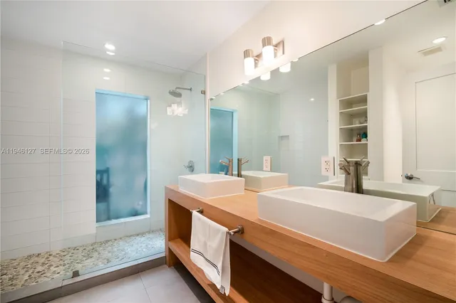 a view of a patio with a table chairs and a backyard