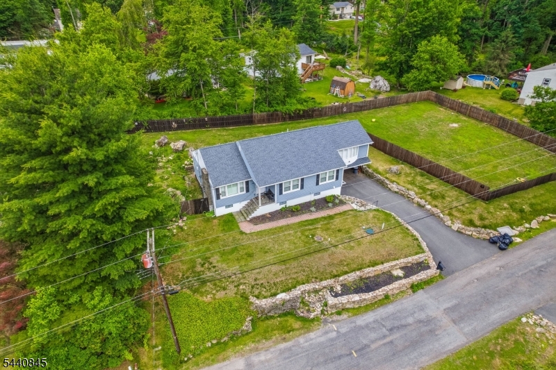 36 Forest Road Andover, NJ 07821 - Photo 19 of 50 an aerial view of a house with a yard