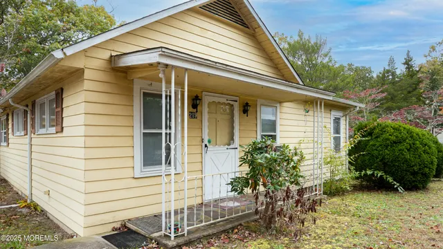 a view of house with patio