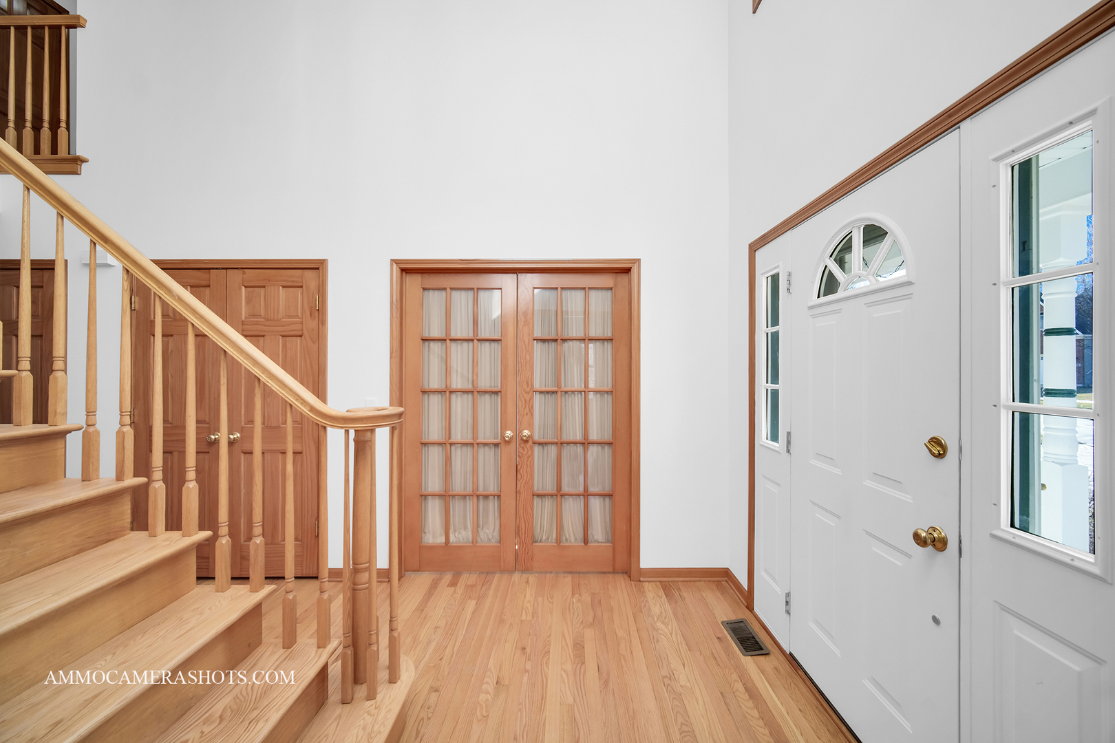255 West Harrison Road Lombard, IL 60148 - Photo 5 of 36 a view of an entryway with wooden floor and door