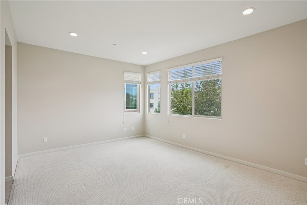143 Frame Irvine, CA 92618 - Photo 10 of 41 a view of an empty room with a window