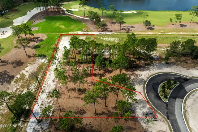 a backyard of a house with a garden and outdoor seating