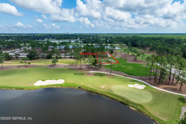 a view of a lake with a city