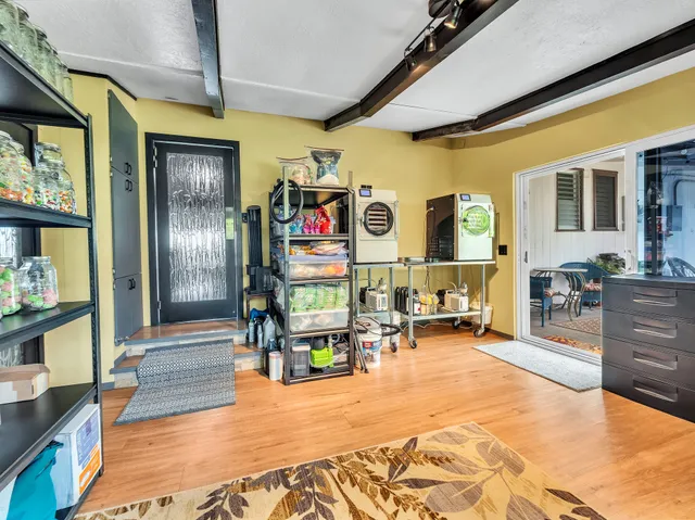 a living room filled with furniture and a table