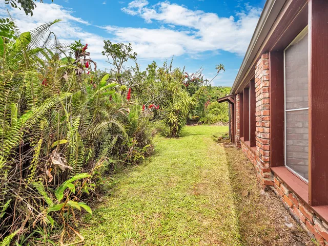 a view of a yard with an outdoor space