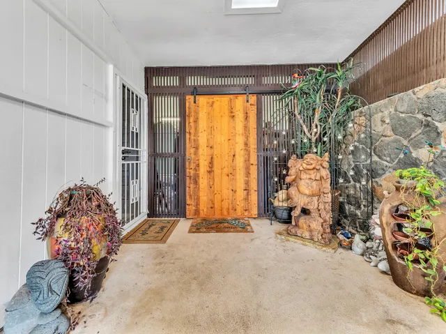 a view of a room with toys and a floor to ceiling window