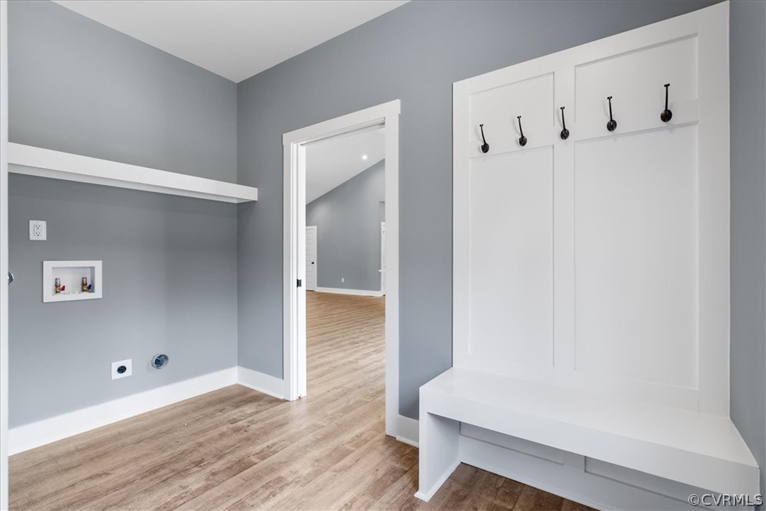 1593 Spreading Oak Road Arvonia, VA 23004 - Photo 22 of 40 a view of room with hardwood floor and hallway