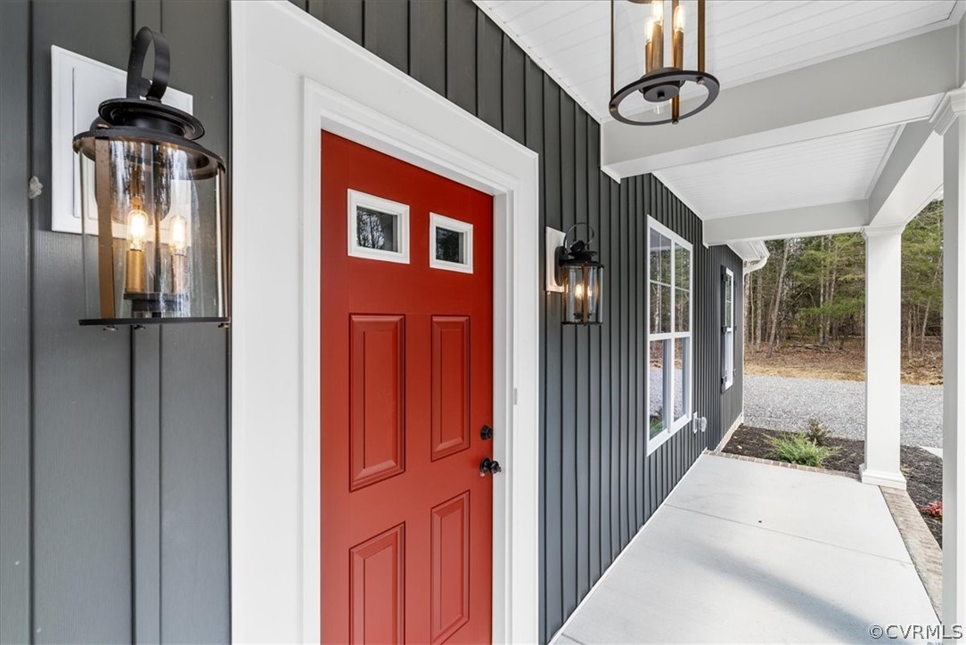 1593 Spreading Oak Road Arvonia, VA 23004 - Photo 10 of 40 a view of a entryway door front of a house