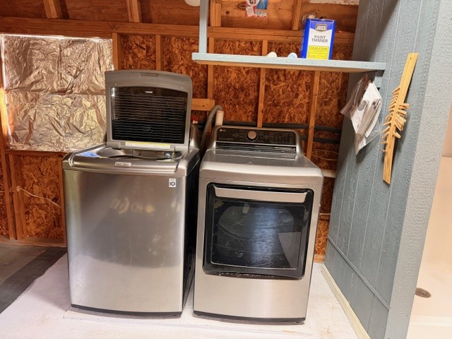 7422 Greenstone Street Houston, TX 77087 - Photo 13 of 15 a view of washer and dryer in a utility room