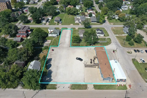 an aerial view of a house with outdoor space