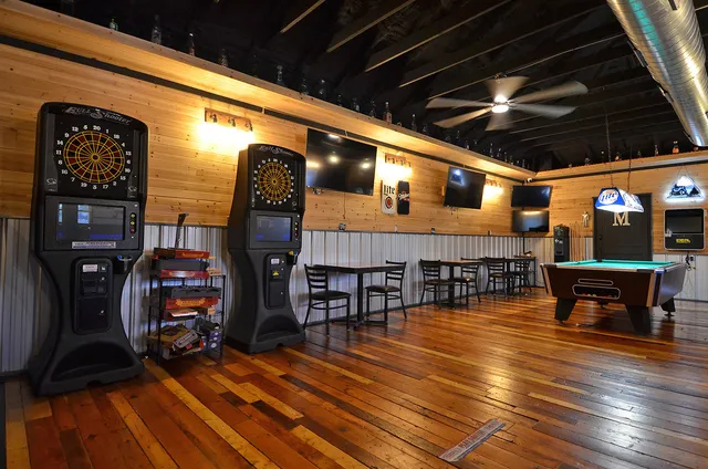 a front view of a house with outdoor seating