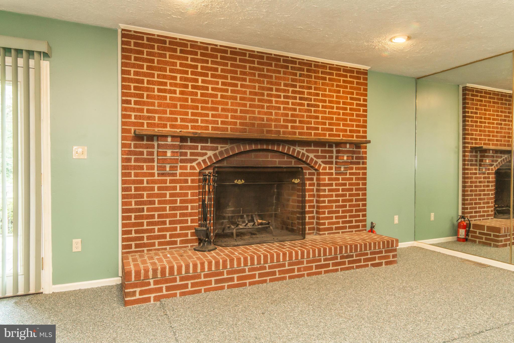 7417 Robin Road La Plata, MD 20646 - Photo 11 of 29 brick fireplace