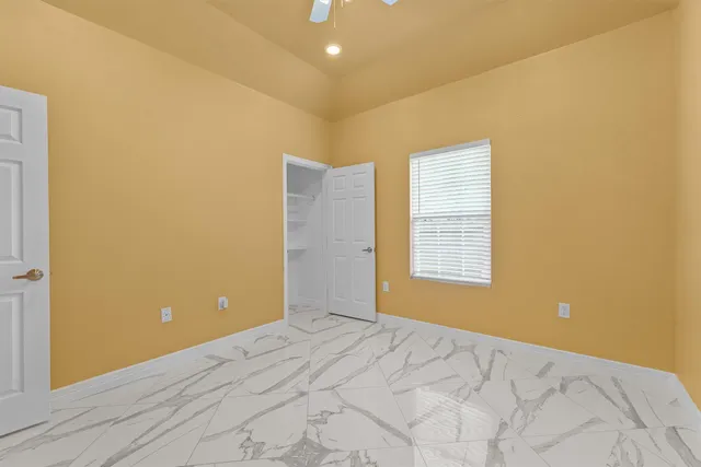 a view of a room with a window