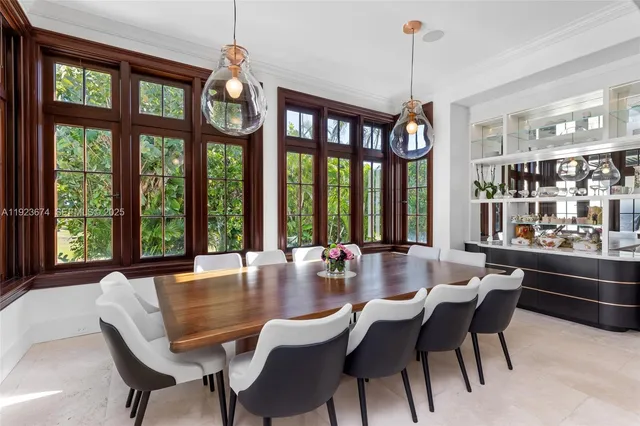 a kitchen with stainless steel appliances a sink and cabinets