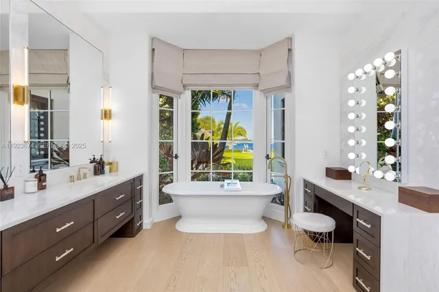 a bathroom with a double vanity sink mirror and double