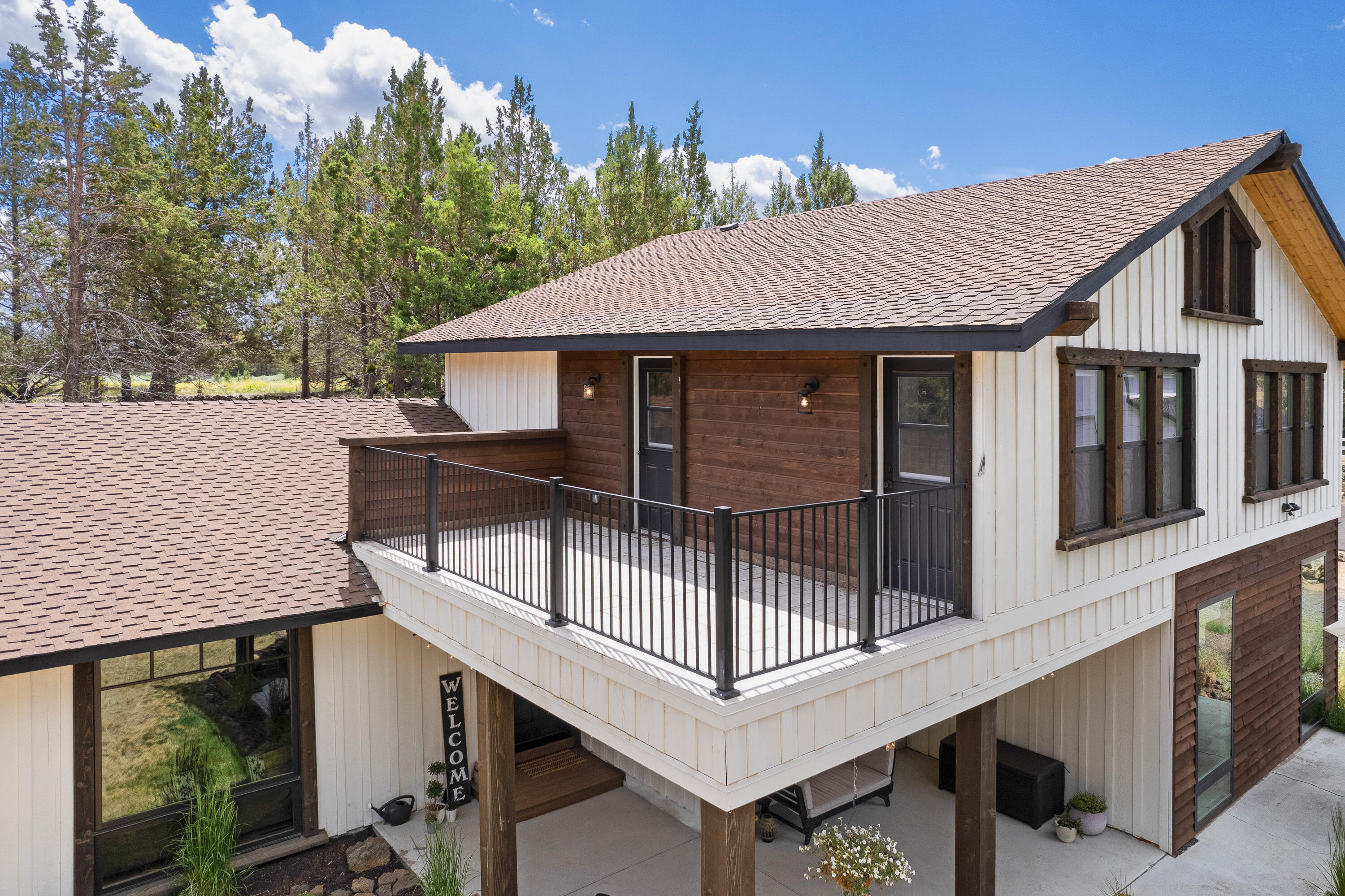 64732 Hunnell Road Bend, OR 97703 - Photo 37 of 51 a view of house with a roof deck