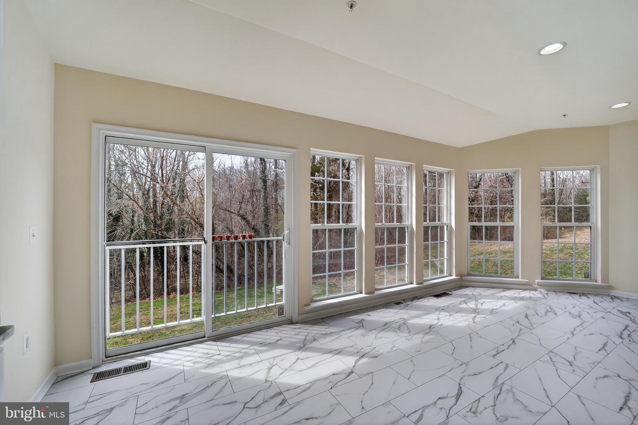 16101 Venice Road Aquasco, MD 20608 - Photo 23 of 61 a view of a room with balcony and large windows