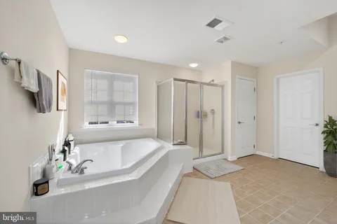 a bathroom with a sink toilet and a mirror