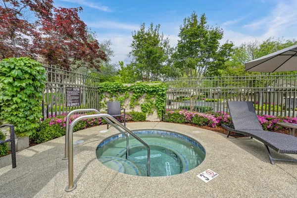 a view of swimming pool from a balcony