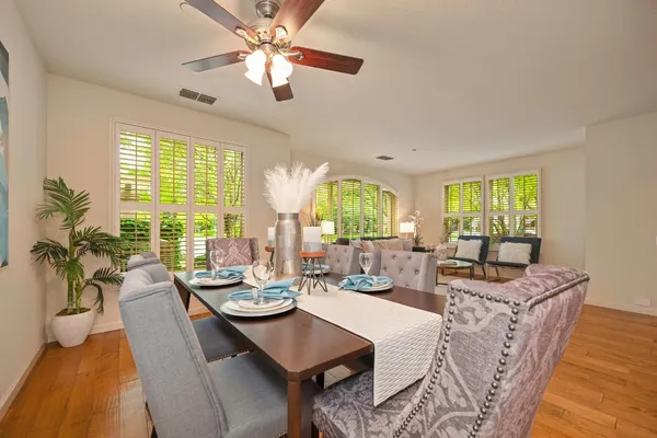 a view of a dining room with furniture window and outside view