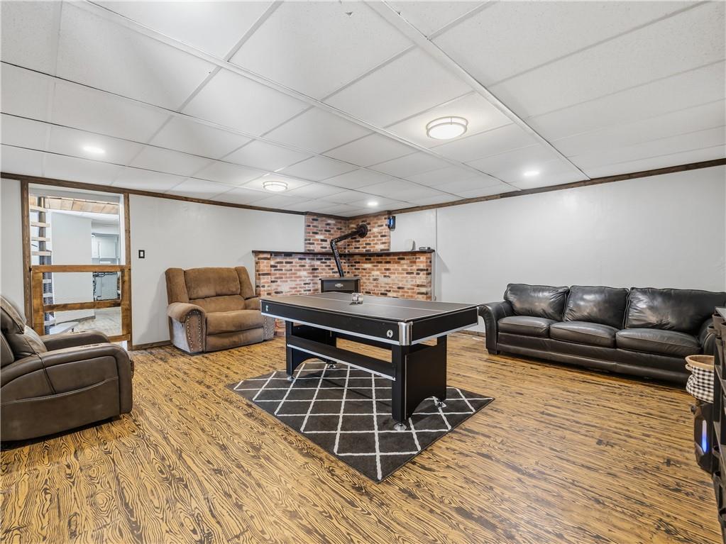 893 Dillie Road Prosperity, PA 15329 - Photo 12 of 42 Lower family room with pellet stove