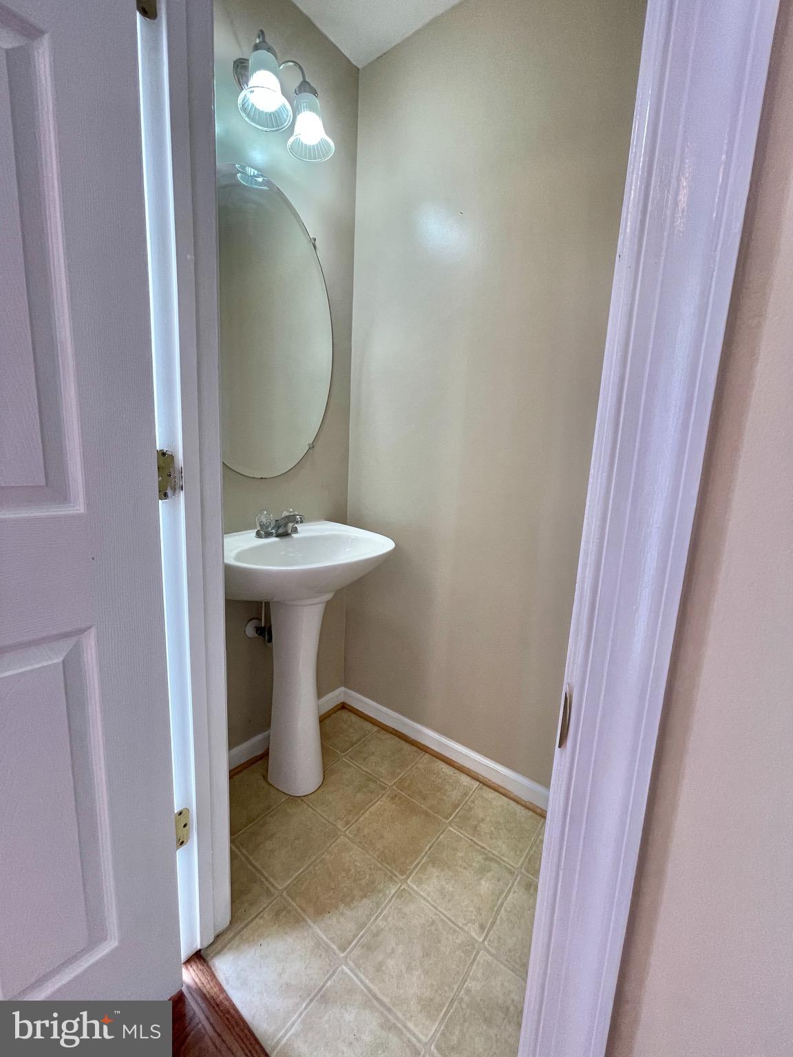 9738 Selfridge Road Baltimore, MD 21220 - Photo 22 of 37 Second Floor Powder Room