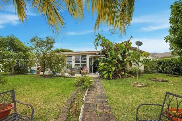 a garden view with a seating space
