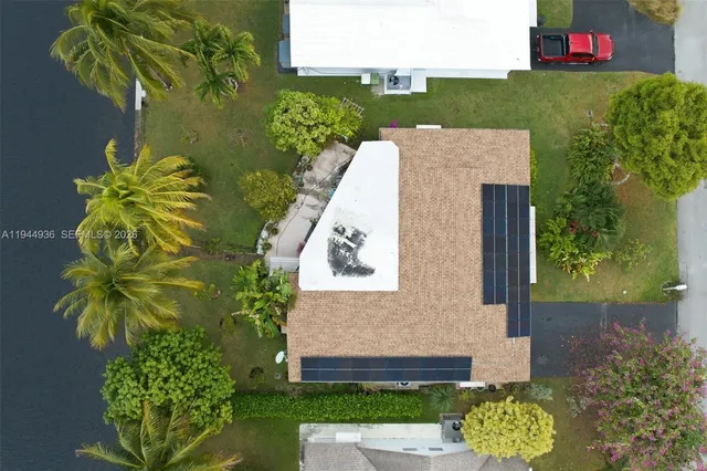 a view of a house with a small yard