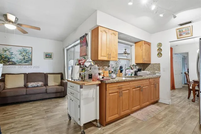a living room with furniture and windows
