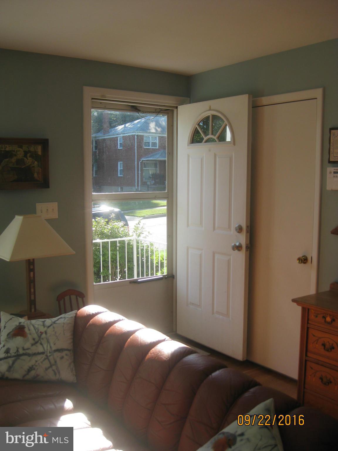1212 Brixton Road Baltimore, MD 21239 - Photo 2 of 25 Entrance into Living Room